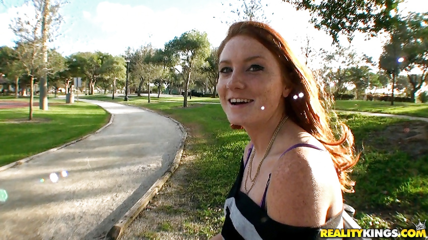Redhead lady is playing with the cock of man she's just met in the street
