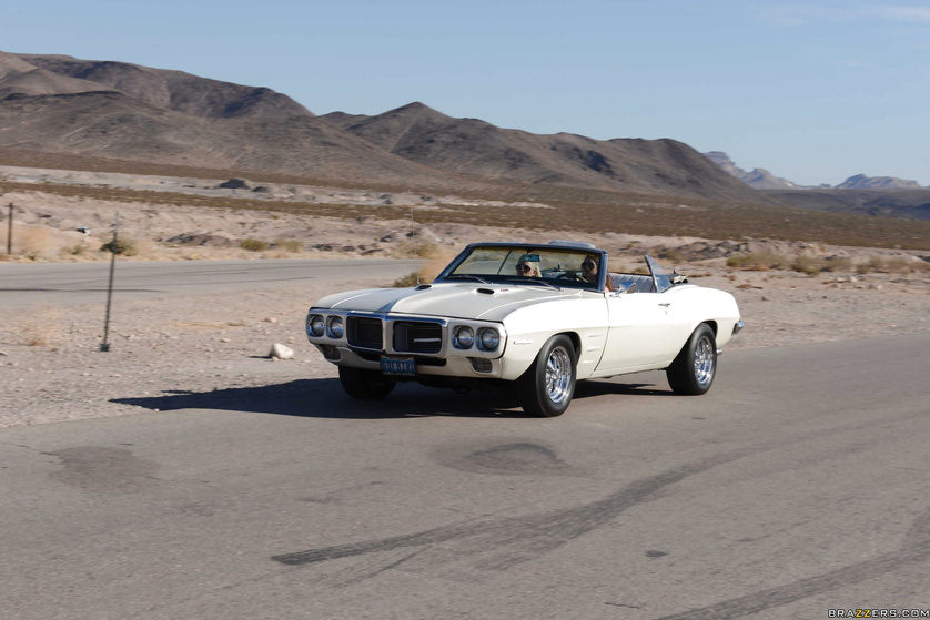 Wild lesbians are having passionate sex on the white car