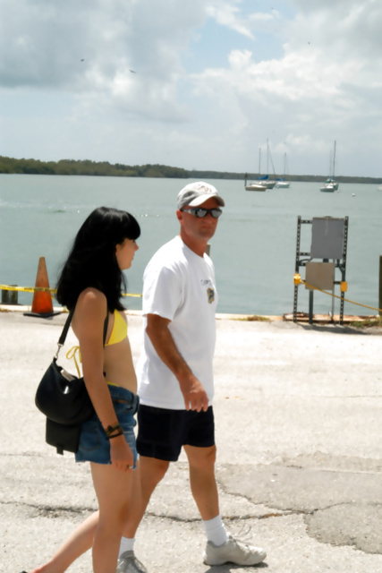 Amateur brunette is invited for a hot ride on the guy's big boat