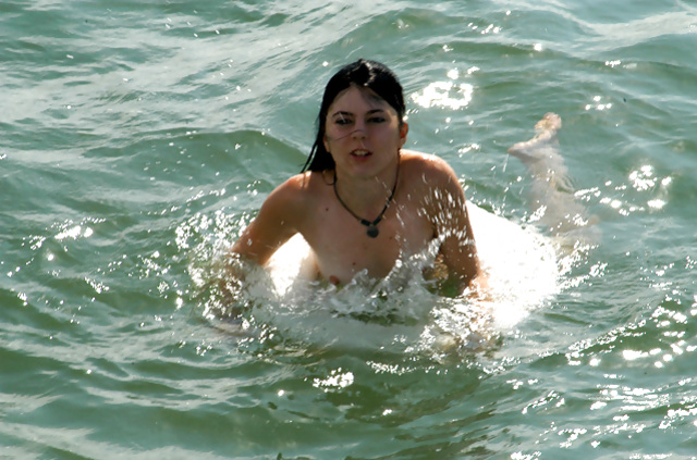 Amateur brunette is invited for a hot ride on the guy's big boat