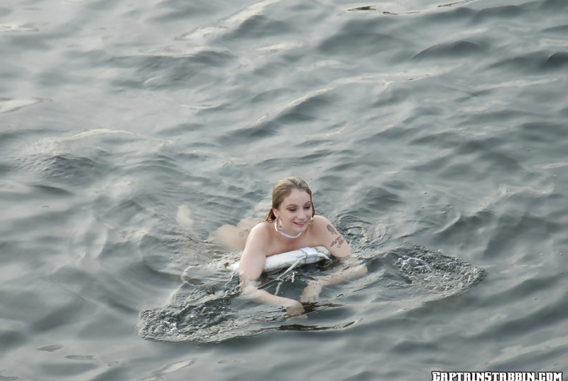 Fuck this slutty blonde passionately and push her into the sea